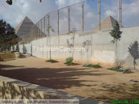 Wall enclosure to hide the cemetary.    This is part of one of the rock quarries.  This is very near the location of the pyramids at Giza.  Do your re